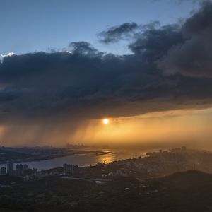 Preview wallpaper sunset, city, river, clouds, aerial view