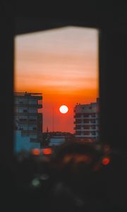 Preview wallpaper sunset, city, sun, building