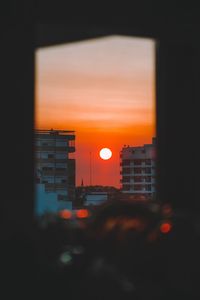 Preview wallpaper sunset, city, sun, building