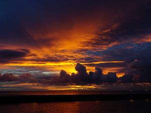 Preview wallpaper sunset, clouds, dark, sea, landscape