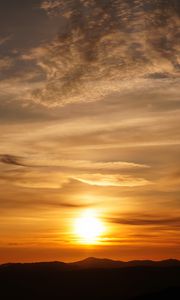 Preview wallpaper sunset, clouds, hills, sun, sky