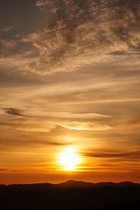 Preview wallpaper sunset, clouds, hills, sun, sky