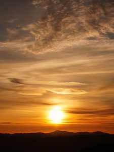 Preview wallpaper sunset, clouds, hills, sun, sky