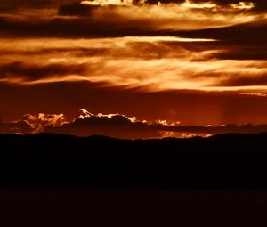 Preview wallpaper sunset, clouds, horizon, twilight, dark