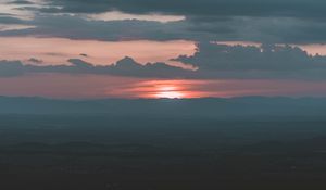 Preview wallpaper sunset, clouds, horizon, fog, dusk