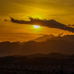 Preview wallpaper sunset, clouds, mountains, peaks