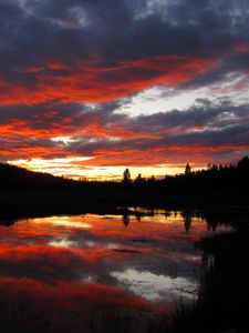 Preview wallpaper sunset, clouds, nature, trees, lake, reflection