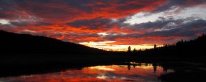 Preview wallpaper sunset, clouds, nature, trees, lake, reflection