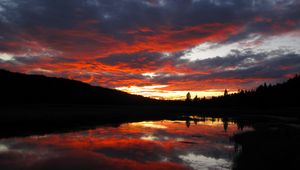 Preview wallpaper sunset, clouds, nature, trees, lake, reflection