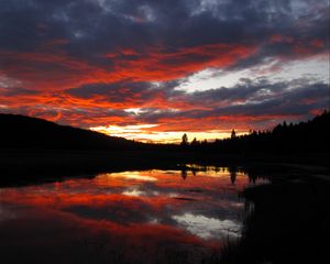 Preview wallpaper sunset, clouds, nature, trees, lake, reflection