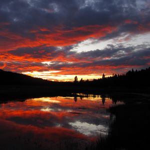 Preview wallpaper sunset, clouds, nature, trees, lake, reflection