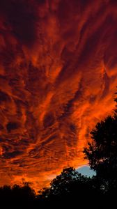 Preview wallpaper sunset, clouds, porous, dark