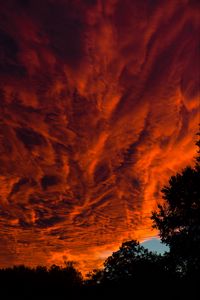 Preview wallpaper sunset, clouds, porous, dark