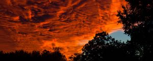 Preview wallpaper sunset, clouds, porous, dark