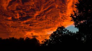 Preview wallpaper sunset, clouds, porous, dark