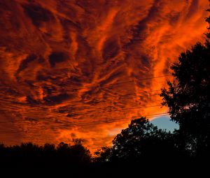 Preview wallpaper sunset, clouds, porous, dark
