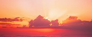 Preview wallpaper sunset, clouds, rays, slope