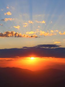 Preview wallpaper sunset, clouds, sky, mountains