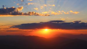 Preview wallpaper sunset, clouds, sky, mountains