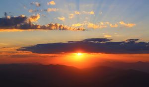 Preview wallpaper sunset, clouds, sky, mountains