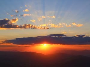 Preview wallpaper sunset, clouds, sky, mountains