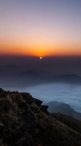 Preview wallpaper sunset, clouds, sky, fog, peak