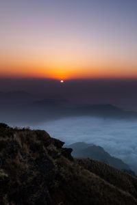 Preview wallpaper sunset, clouds, sky, fog, peak