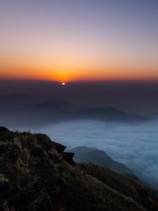 Preview wallpaper sunset, clouds, sky, fog, peak