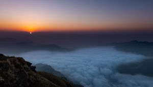 Preview wallpaper sunset, clouds, sky, fog, peak