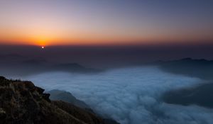 Preview wallpaper sunset, clouds, sky, fog, peak