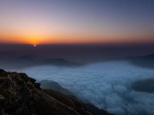 Preview wallpaper sunset, clouds, sky, fog, peak