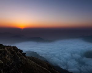 Preview wallpaper sunset, clouds, sky, fog, peak