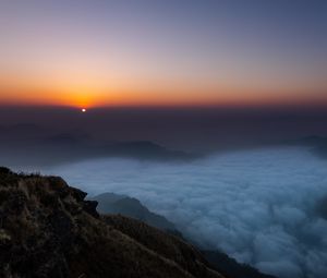 Preview wallpaper sunset, clouds, sky, fog, peak