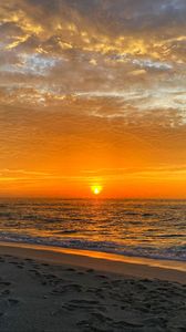 Preview wallpaper sunset, coast, beach, sea, horizon