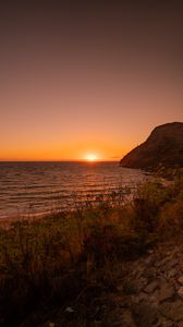 Preview wallpaper sunset, coast, sea, horizon