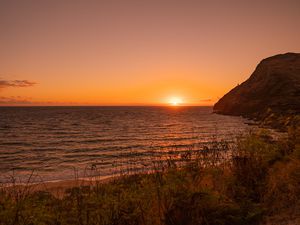 Preview wallpaper sunset, coast, sea, horizon