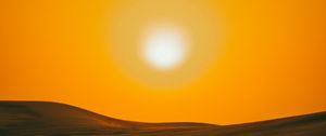 Preview wallpaper sunset, desert, hills, sun, dusk
