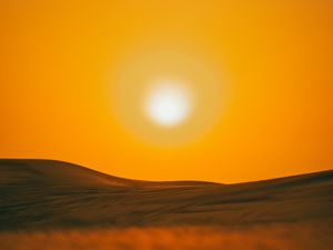 Preview wallpaper sunset, desert, hills, sun, dusk
