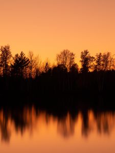 Preview wallpaper sunset, dusk, trees, water, reflection