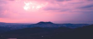 Preview wallpaper sunset, evening, far, mountains