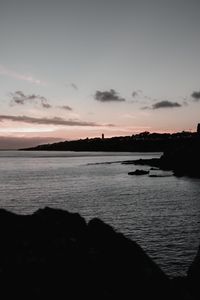 Preview wallpaper sunset, evening, sea, rocks, sky