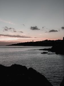 Preview wallpaper sunset, evening, sea, rocks, sky