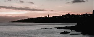 Preview wallpaper sunset, evening, sea, rocks, sky