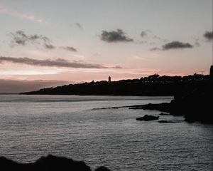 Preview wallpaper sunset, evening, sea, rocks, sky