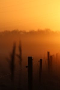 Preview wallpaper sunset, fence, fog, dusk