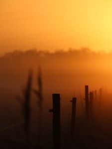 Preview wallpaper sunset, fence, fog, dusk