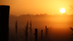 Preview wallpaper sunset, fence, fog, dusk