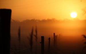 Preview wallpaper sunset, fence, fog, dusk