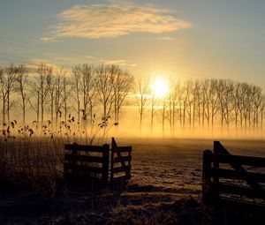 Preview wallpaper sunset, field, fence, landscape