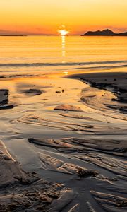 Preview wallpaper sunset, glare, sea, coast, sand